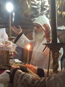 Bishop Boutros (Peter) of the Coptic Orthodox church celebrating liturgy in the Tomb of the Virgin Mary