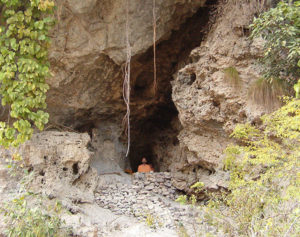 Jesus Cave with monk meditating