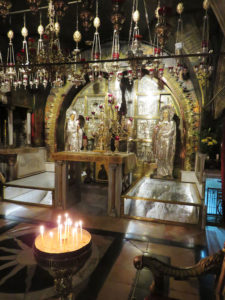 Golgatha, the site of the crucifixion, with the rent stones protected by glass cases. A must-see when making a Jerusalem pilgrimage