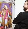 man looking in mirror